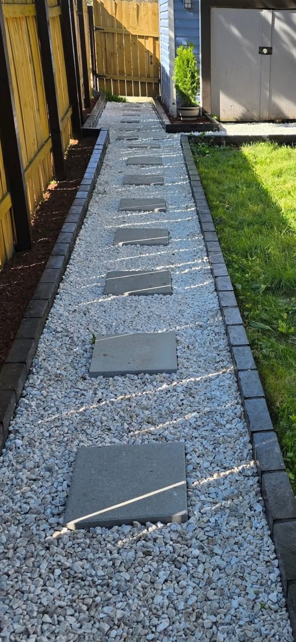 Stepping-stone path with gravel bed